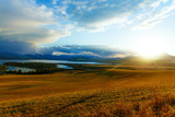 Fototapeta Góry - Beautiful landscape, yellow meadow and lake with mountains 