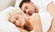 © Syda Productions - happy couple sleeping in bed at home