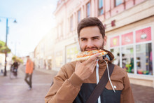 Man Eating Pizza