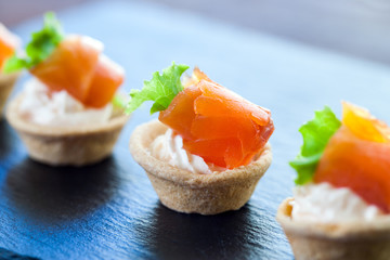 Wall Mural - Mini smoked salmon pastry tartlets for catering.