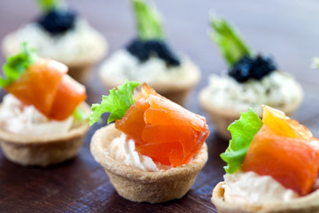 Wall Mural - Multiple mini seafood pastry tartlets.