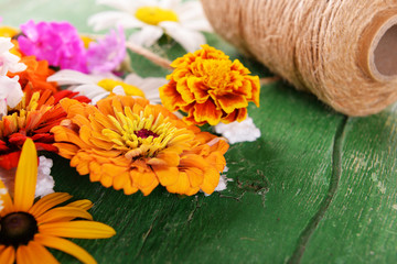 Sticker - Fresh colorful flowers on wooden table, closeup