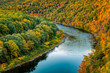 Delaware river bends through a colorful autumn forest, near Port Jervis, New York