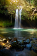 Sun-lit waterfall