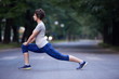 woman  stretching before morning jogging