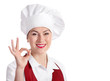 © bit24 - Smiling female chef isolated on white background