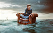 © lassedesignen - Man on a seat lost at sea