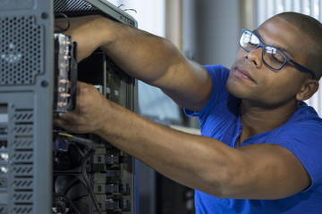 Technician working on computer/server