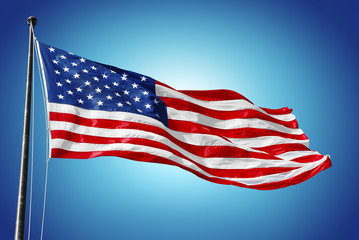 Wall Mural - American flag on blue sky