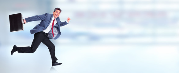 Wall Mural - Happy running businessman.