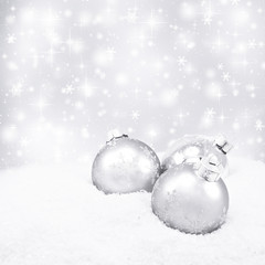 three silver christmas balls