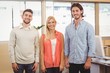 © WavebreakmediaMicro - Portrait of smiling business people in meeting room