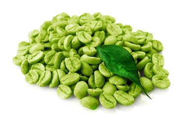 Poster - Heap of green coffee beans with leaf isolated on white