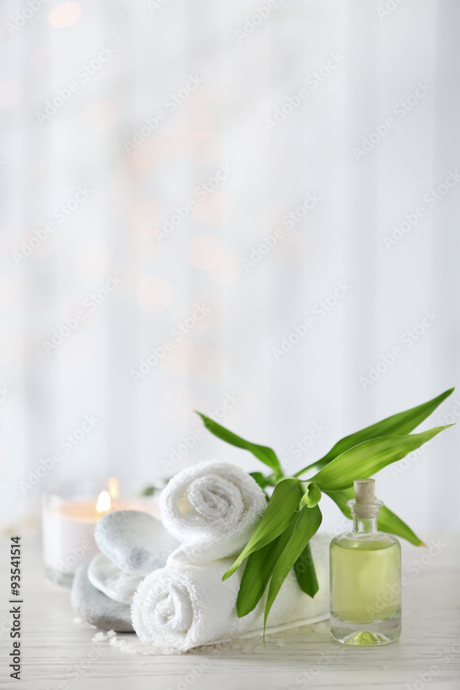 Beautiful composition of spa treatment on wooden table