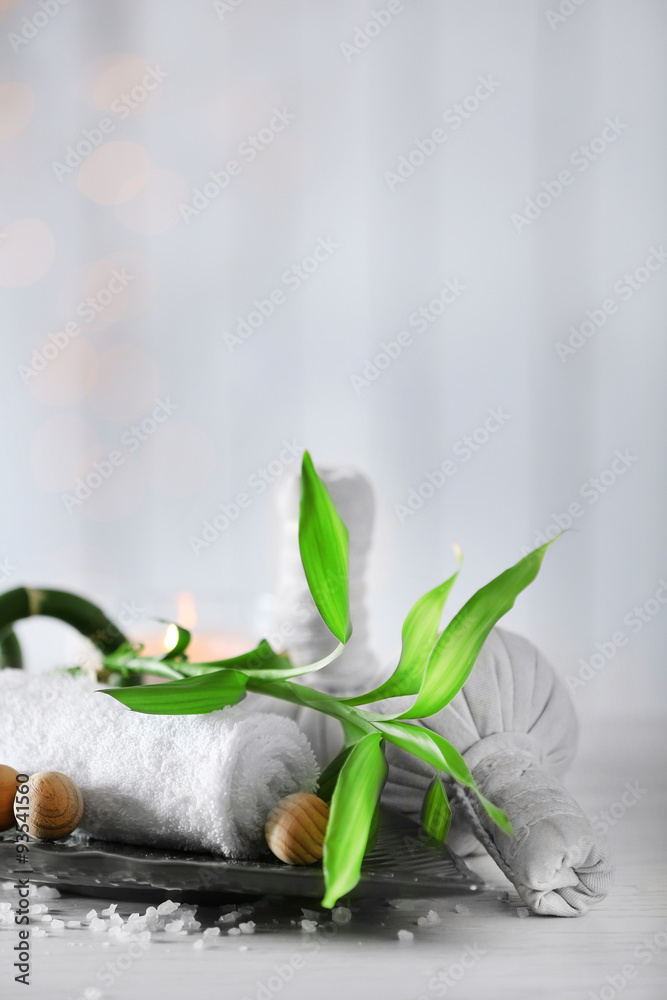 Beautiful composition of spa treatment on wooden table