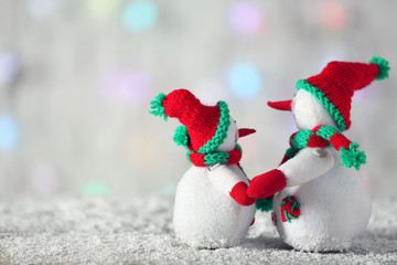 Sticker - Cute snowmen on Christmas background