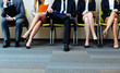 © baranq - A group of candidates waiting to be interviewed