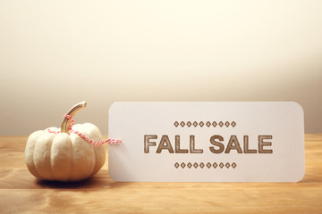 Wall Mural - fall sale message with small pumpkin