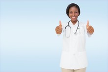 Composite Image Of Young Nurse Giving Thumbs Up