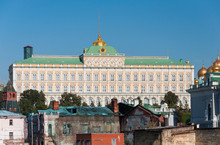 Grand Kremlin Palace On The Background Of Old Ruined Houses. 