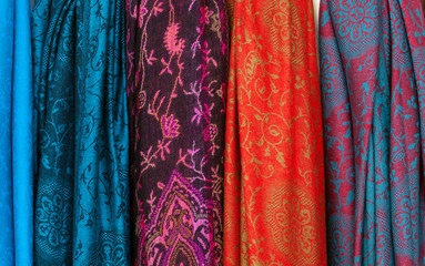 Colorful scarves hanging in the market