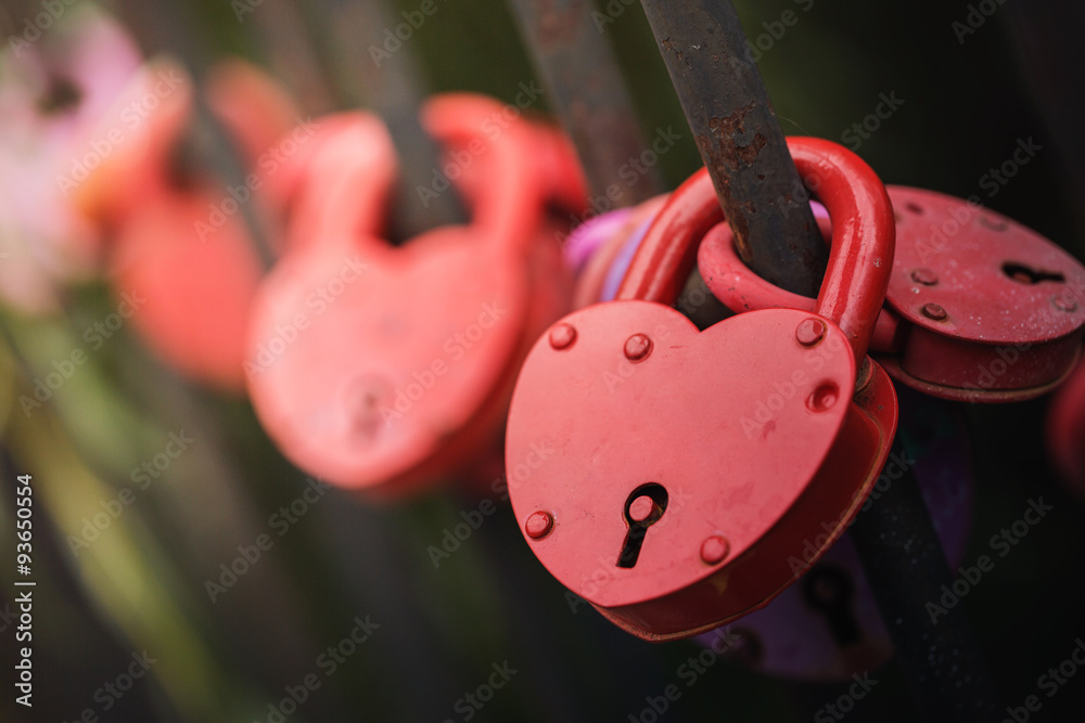 Red lock in the shape of heart as symbol of love Stock Photo | Adobe Stock