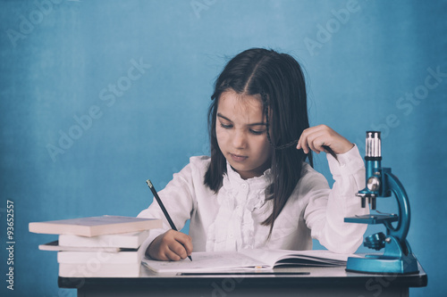 Color Old Fashioned Image Of A Serious Little Girl Student
