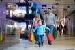 © .shock - young family with shopping bags