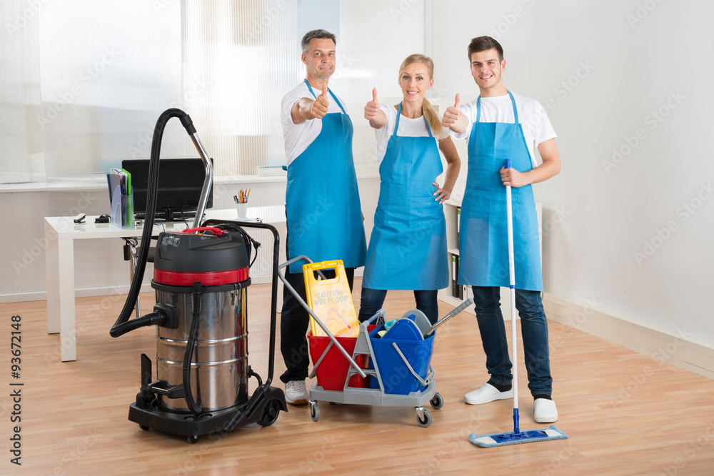 Janitors With Vacuum Cleaner And Cleaning Equipments Stock Photo ...