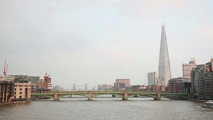 Wall Mural - London cityscape with Thames river and bridges on foreground
