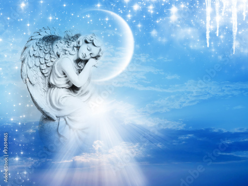 Fotografie, Obraz an angel statue over mystical sky with divine light and stars