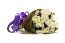 Beautiful Bouquet Of White Rose With Purple Ribbon On White Background