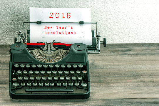 Typewriter with white paper page. New Year's Resolutions