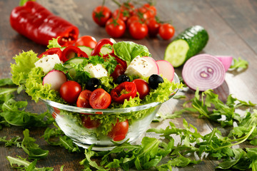 Vegetable salad bowl on kitchen table. Balanced diet