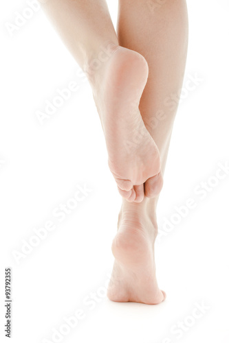 Fotografie, Obraz Well groomed female feet, soles isolated on white background.