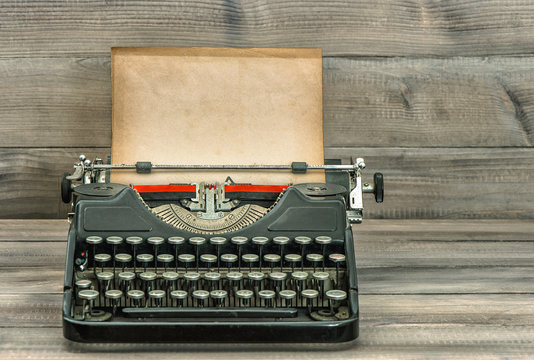Antique typewriter with grungy paper. Retro style