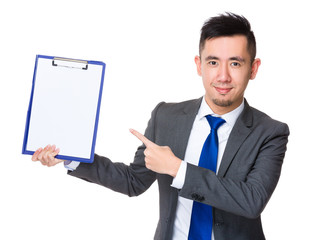 Canvas Print - Young Businessman finger point to clipboard