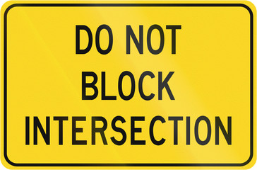 Wall Mural - Road sign in Canada - Do not block intersection. This sign is used in Ontario