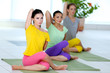 © Africa Studio - Young attractive girls do yoga
