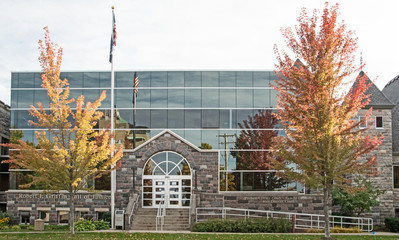 Wall Mural - The state courthouse for the 86th District in Traverse City, Michigan with autumn colors