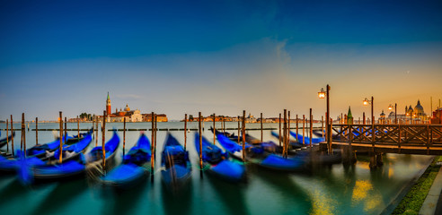 Wall Mural - Gondolas in Venice - twilight with San Giorgio Maggiore church. San Marco, Venice, Italy