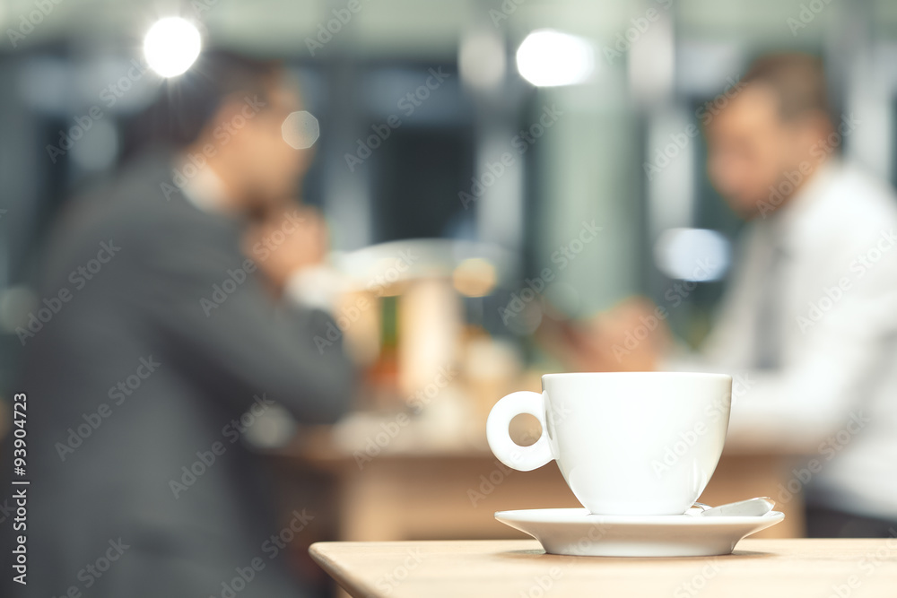Obraz na płótnie Cup of coffee on a table w salonie