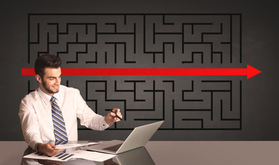 Wall Mural - businessman with a solved puzzle in background