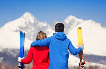 Wall Mural - Young couple skiing