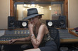 © HEX - Portrait of a young woman in a recording studio