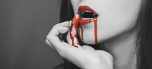 Vampire Wipes The Blood From Her Lips