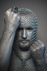 Wall Mural - Fantasy, man in chain mail and leather painted silver, medieval