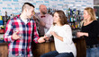 © JackF - Man talking to a woman in a bar