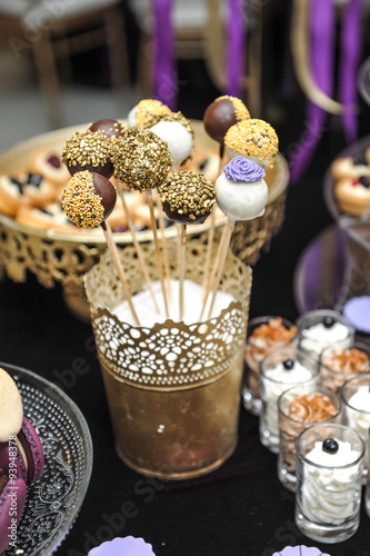 Wedding Decoration With Various Lollipops In Golden Support