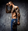 © Fxquadro - Awesome tattooed bearded man.